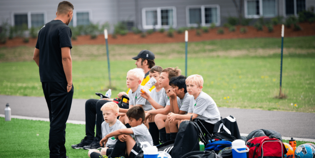 Coach and youth team meeting